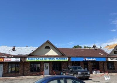 Guardian Roofing team working on a residential roof in Regina – roofing companies Regina