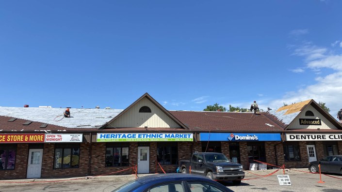 Guardian Roofing team working on a residential roof in Regina – roofing companies Regina